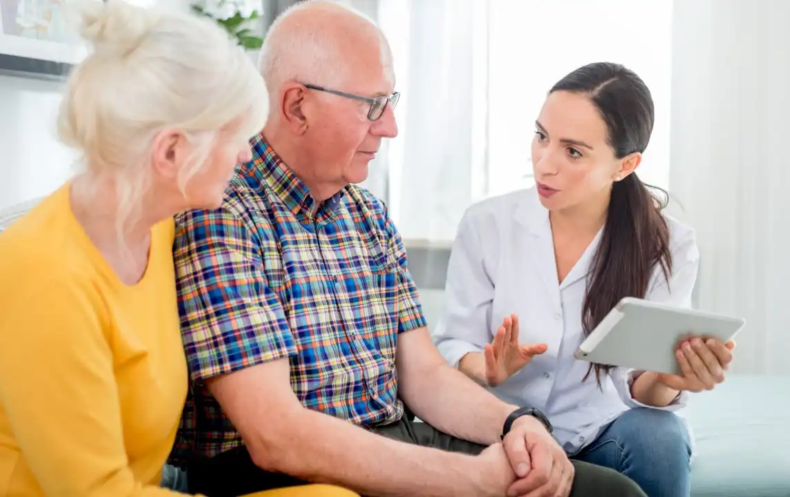 discusses palliative care options with a patient