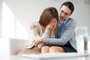 Person grieving the loss of a loved one