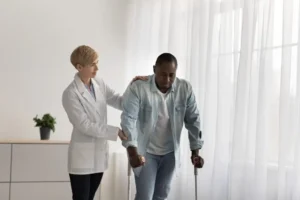 Therapist helping a patient during rehabilitation
