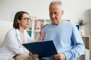 Older patient reading a medical report