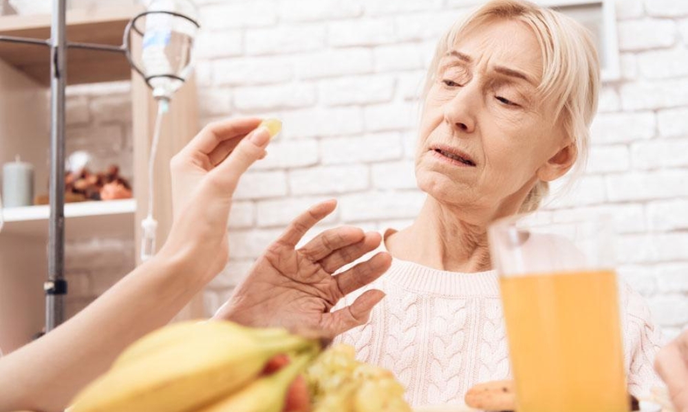 Family receiving hospice support at home from nurse